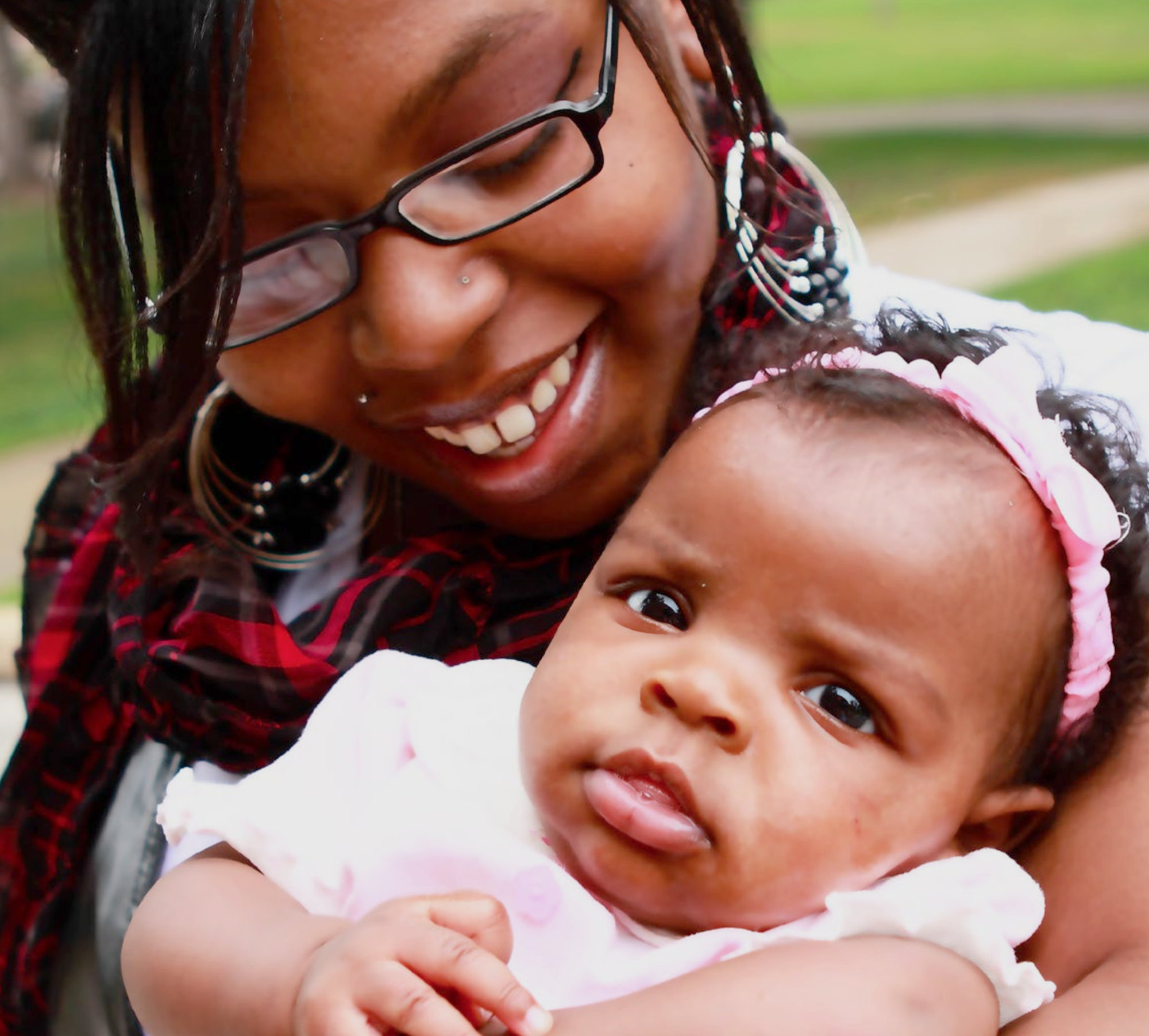 Mother holding cute baby